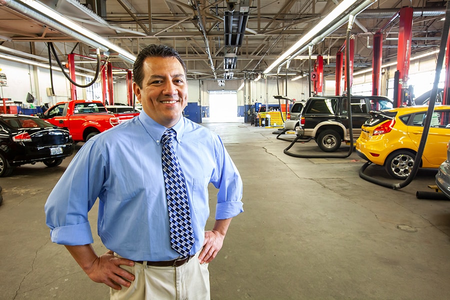 Happy Auto And Truck Repair Shop Owner