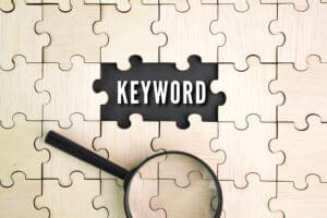 Conducting thorough keyword research for paid ads